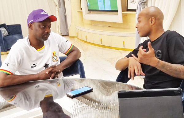  Andre Ayew (right) explaining a point to Graphic Sports Editor, Maurice Quansah