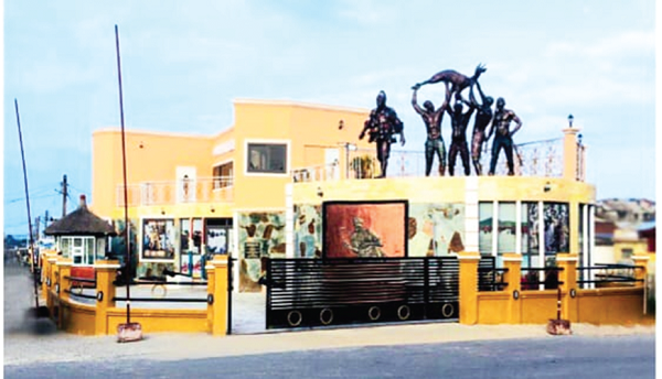 A sculpture of Asafo men carrying a catch (bushbuck) at the Osimpam Heritage Centre