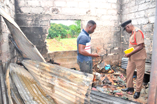 ACFO Ameyibor (right) at the scene
