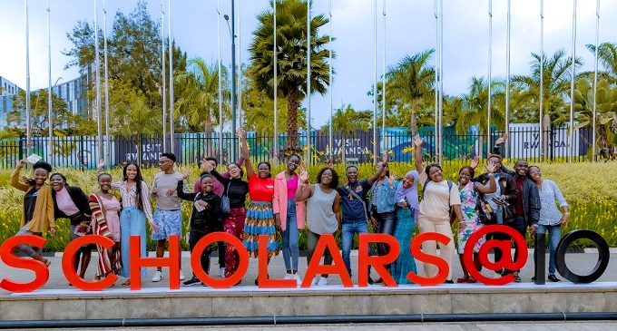 A group of Mastercard Foundation Scholars express excitement at the Baobab Summit 2022, in Kigali, Rwanda. The Mastercard Foundation Scholars Program–an education and leadership initiative that has directly impacted nearly 40,000 young people, primarily in Africa – this year celebrates a decade of transformative impact and learning. 