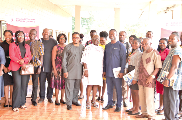 Ernest Ortsin (4th from right), President, Ghana HIV and AIDS Network, with Dr Nii Nortey Hanson-Nortey (5th from left), Public Health Consultant, Hilly Consult, and Trudi Nunoo (arrowed), Technical Advisor, FHI 360 Epic Ghana, at the workshop. Picture: ELVIS NII NOI DOWUONA