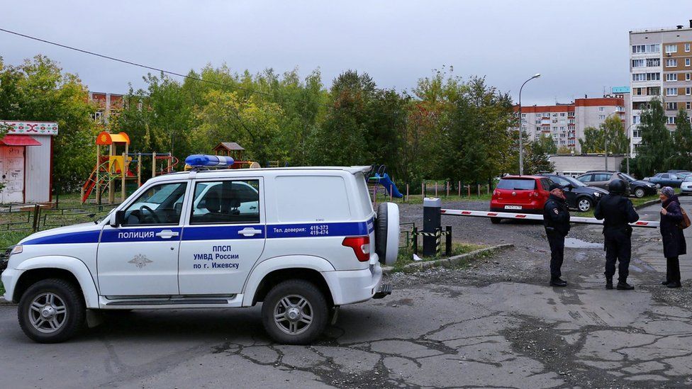 Security services arrive at the scene of the shooting.