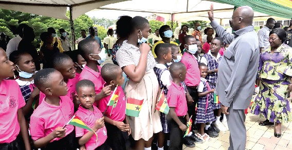 Vice-President Dr Mahamudu Bawumia together with Akosua Frema Osei Opare (right), Chief of Staff, Office of the President, exchanging pleasantries with some school children at the Jubilee House. Picture: SAMUEL TEI ADANO