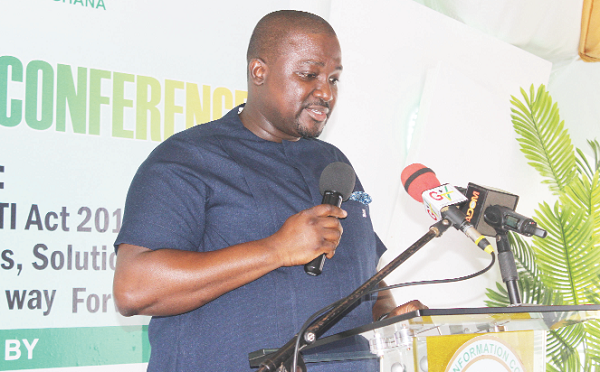 Yaw Sarpong Boateng (left), Executive Secretary, Right to Information Commission, addressing participants in the conference