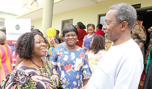 Yisa Barnabas (right), UNFPA Country Representative in Ghana, interacting with Mawutor Ablo (left), the Director of the Ghana Productive Safety Net Project at the Ministry of Gender, Children and Social Protection, and Malonin Asibi (middle), Head of Domestic Violence Secretariat of the MoGCSP, after the workshop in Accra. Picture: GABRIEL AHIABOR