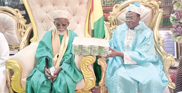• Nakoa Prophet Nazareth Ansah Jamson (right), Spiritual Leader of the Prophets and Spiritual Council, Ghana, making the presentation to Sheikh Osman Nuhu Sharubutu, the National Chief Imam, at his residence in Accra 