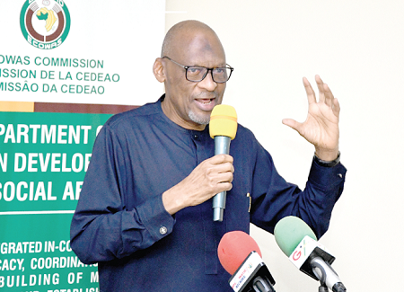 Baba Gana Wakil (left), ECOWAS Resident Representative, addressing the delegates. Picture: EBOW HANSON