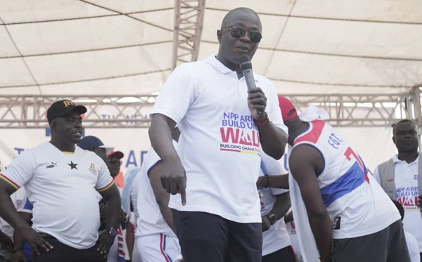 Bryan Acheampong, Minister of Food and Agriculture, speaking at the health walk