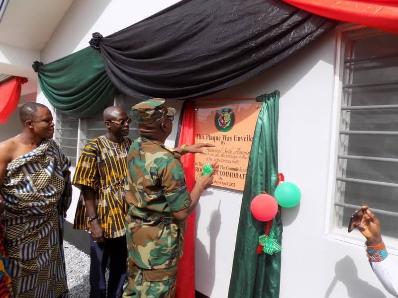 Vice Admiral Seth Amoama cutting the tape to inaugurate the residential apartments for military officers.