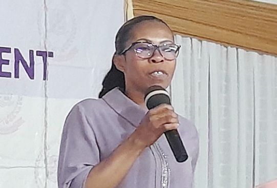 • Akosua Serwaa Bonsu (inset), a  clinical psychologist at the Eastern Regional Hospital, speaking at the ceremony