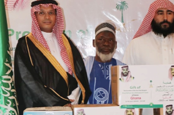 • Dr Abass Shamsudeen Ibrahim (right), representative of the Saudi Ministry of Islamic Affairs; Sheikh Khidr Idress (middle), Imam of Ahlussunah in Accra, and Saeed Al-Bakr, Charge d’affaires at the Embassy of the Kingdom of Saudi Arabia in Accra, with the items