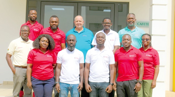 •  Sampson Opare-Agyemang (left), President of the IFMA-Ghana, with some participants in the Facility Management Professional Training 