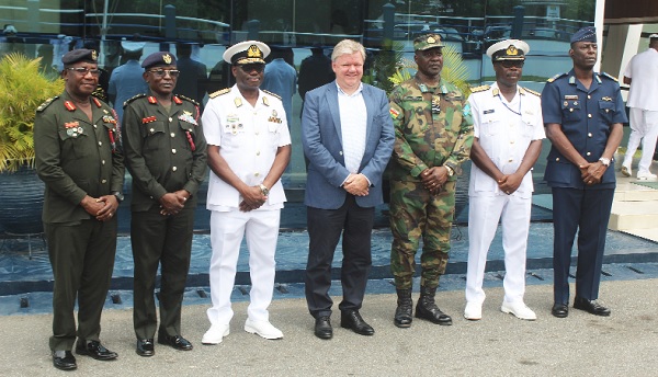 • Tom Nørring (middle), Danish Ambassador to Ghana, and Rear Admiral Isaac Adam Yakubu (3rd from left), Chief of the Naval Staff, with  Air Vice Marshal Michael Appiah  Agyekum (3rd from right), the Deputy Chief of Staff in charge of Administration at the General Headquarters. With them are Commodore Prosper Modey (2nd from right), Chief Staff Officer, Ghana Navy, and some other officials present. Pictures: ESTHER ADJORKOR ADJEI