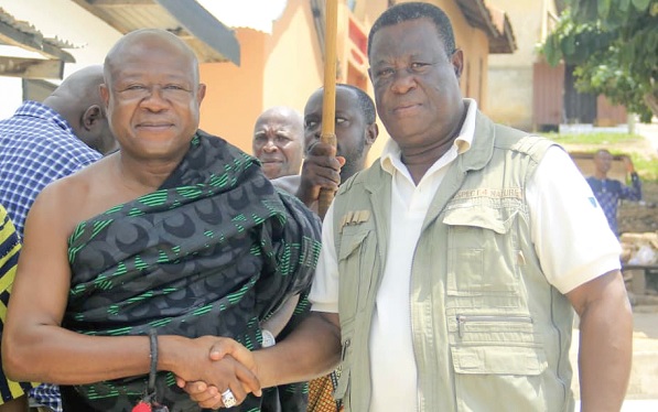 • Kwasi Amoako-Atta (left), Minister of Roads and Highways, in a handshake with Barima Sarfo Tweneboa Kodua, Kumawuhene