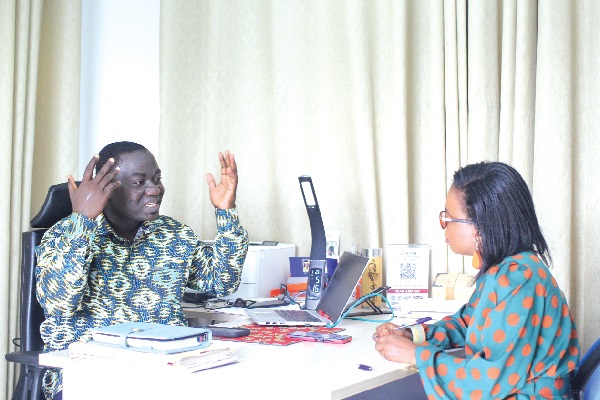 Dr Collins Badu Agyemang (left), National President, Ghana Psychology Association, explaining a point during the interview with, Augustina Tawiah, our Staff Writer. Picture: Maxwell Ocloo
