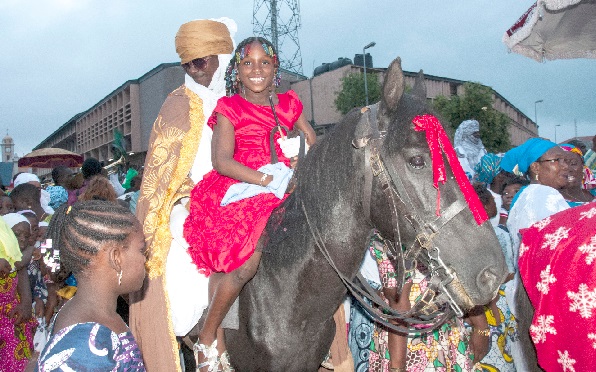 A carnival through some principal streets in the Central Business District of Accra