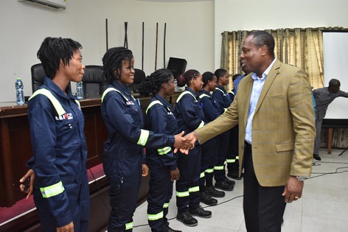 Managing Director of MODEC Ghana, Mr. Theophilus Ahwireng congratulating the selected female trainees