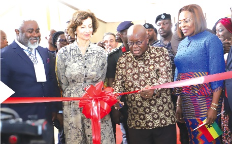 • President Akufo-Addo (2nd from right) cutting a ribbon to declare Accra as the World Book Capital. With him include Audrey Azoulay (2nd from left), Director-General, UNESCO, and Elizabeth Sackey (right), MCE of Accra