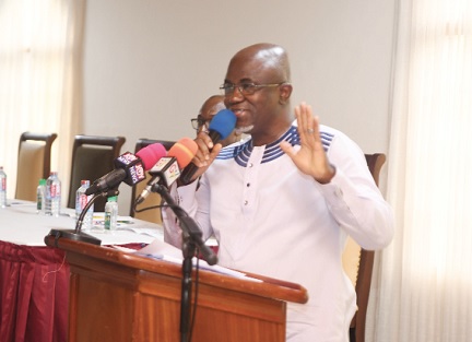 • Jermaine Nkrumah (inset), Board Chairman of the NRSA, speaking at a meeting with stakeholders in the road sector in Accra