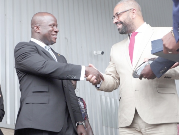  Samuel A. Jinapor (2nd from right), Minister of Lands and Natural Resources, exchanging pleasantries with James Spencer Cleverly (right), the UK Secretary of State for Foreign Commonwealth and Development Affairs, after the event. 