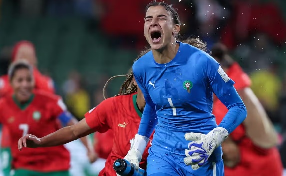 Morocco goalkeeper Khadija Er-Rmichi celebrates her team's victory and qualification for the last 16, along with Colombia. Photograph: Colin Murty/AFP/Getty Images