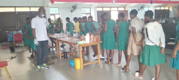 Some of students observing the science practical lessons at Adidome