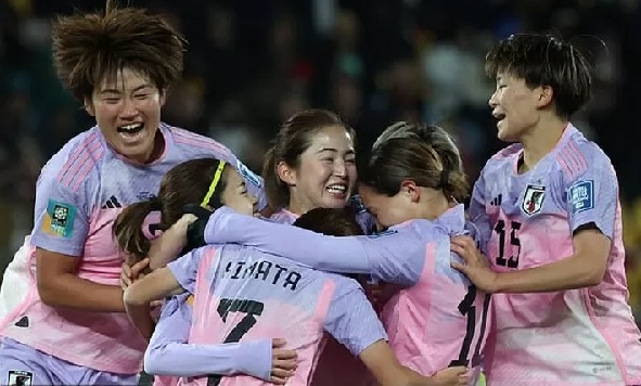 The Japanese celebrating their qualification to the quarter-finals of the Women's World Cup