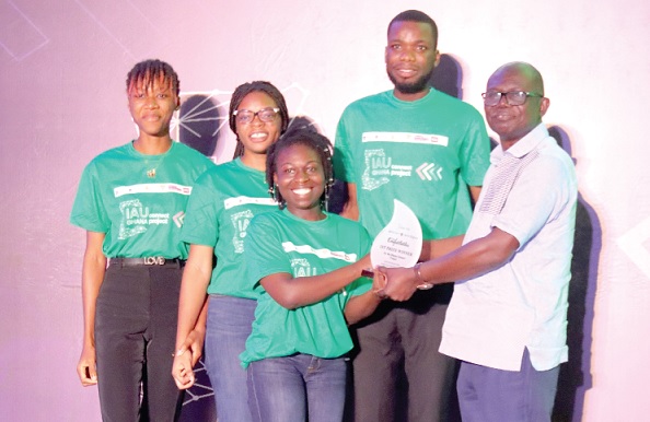 Hannah Appiah (left), Founder, KNUST’s Mchan Organics, receiving the first prize award on behalf of her team, from Felix Asante (right), Pro-Vice Chancellor, Research, Innovation, and Development, University of Ghana. Picture: ELVIS NII NOI DOWUONA
