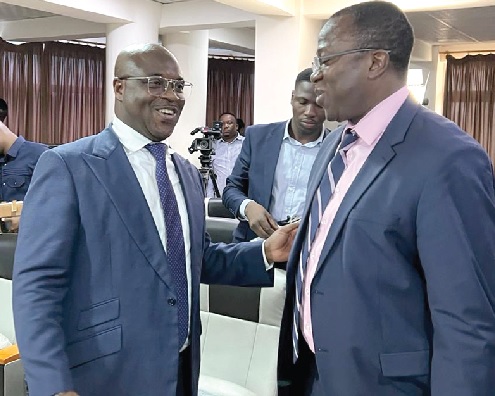 Dr Opoku Ware Ampomah (right), CEO, KBTH interacting with Eric Seddy Kutortse, Executive Chairman, First Sky Group after a press conference to announce the first locally engineered kidney transplant in Ghana