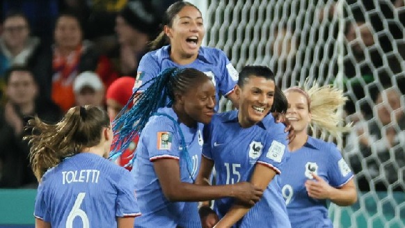 The French celebrating their qualification to the quarter-finals after beating Morocco