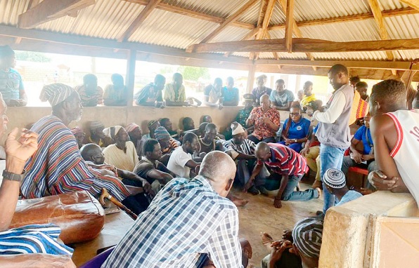 Akosua Danquah Ntim Sekyere (arrowed), Leader of the See something, say something campaign, addressing some members of one of the communities during the tour