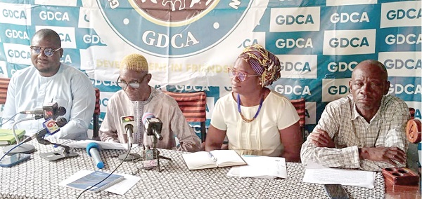 Osman Abdel Rahaman (2nd from  left), Executive Director of GDCA, addressing the media