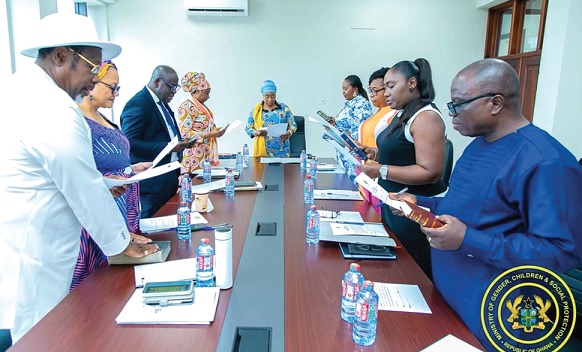 Lariba Zuweira Abudu (middle), Minister for Gender, Children and Social Protection, swearing in the board members