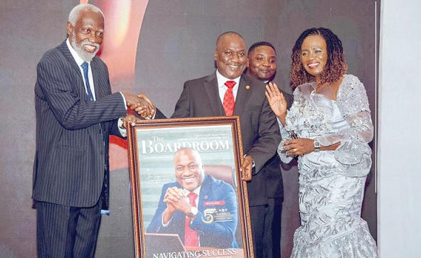 Prof. Stephen Adei (left) presenting a memento to Augustine Appiah