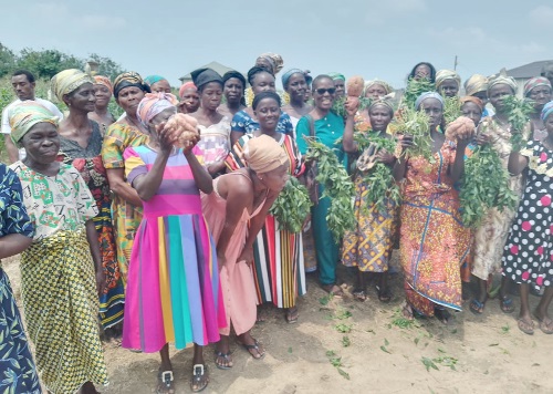 Olympia Williams (in spectacles) with the women farmers after the demonstration