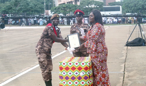 Reuben Ahiaxornu (left) receiving the Overall Best Award  from Naana Eyiah (right), Deputy Minister for the Interior. Picture: ESTHER ADJORKOR ADJEI