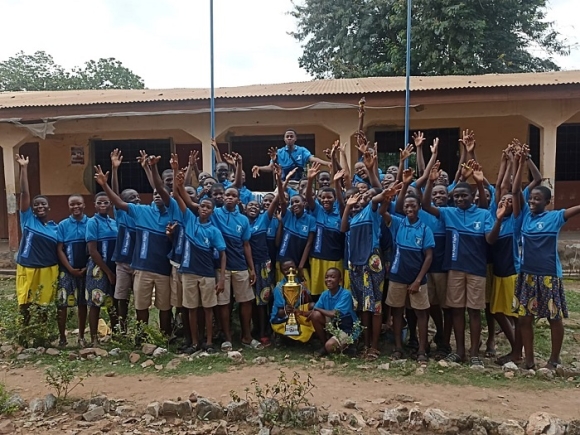 Super Eagle Class of Ayikuma Methodist Basic School in the Shai Osudoku District Jubilating after their final paper