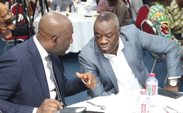Ibrahim Mohammed Awal (right), Minister of Tourism, Arts and Culture, interacting with Kojo Oppong Nkrumah, Minister of Information, at an Editors forum with the Ministry in Accra. Picture: SAMUEL TEI ADANO