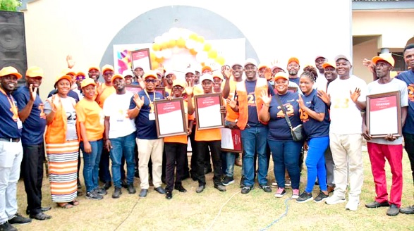 Joshua Baidoo (5th from right), Integrated Programmes Director, World Vision, and some dignitaries with community personnel honoured at the ceremony