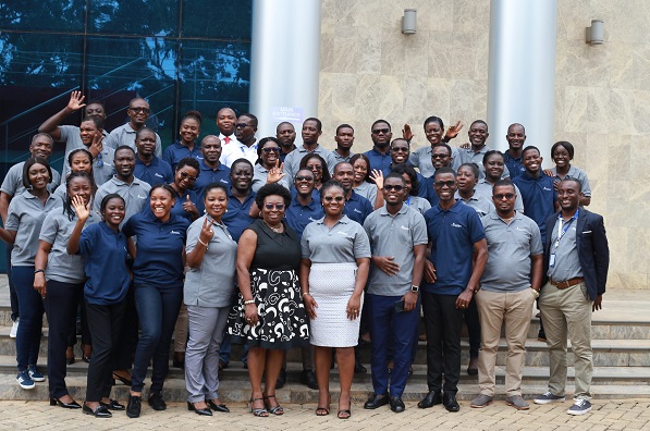 The speakers and some of the participants in a photograph after the event