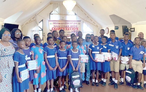 The contestants from the winning schools with  Marian Cobblah (left), Regional Manager of the Anglican Education Unit, after the contest