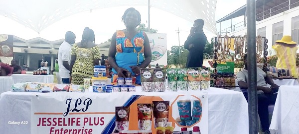 An exhibitor displaying her products at the launch