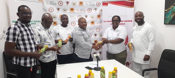 Some officials of Lemon Catering Services presenting samples of the product to the organisers of the Africa Games