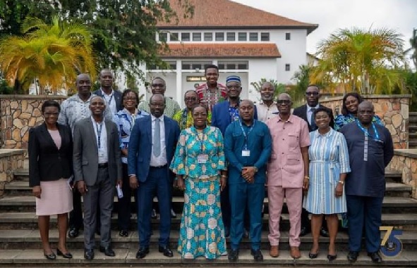 Kurt Okraku (2nd from left) and Prof. Nana Aba Amfo (in print) together with other members of the board