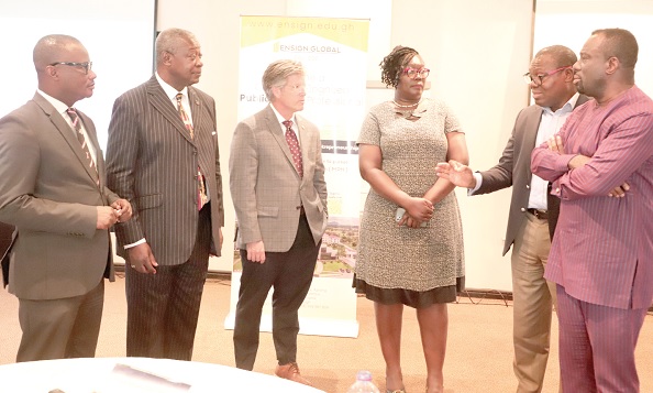 Theophilus N. Ahwireng (2nd from right), Managing Director, MODEC Production Services Ghana JV Limited, explaining a point to Prof. Agyeman Badu Akosa (2nd from left), Board Vice-Chair, Ensign Global College; Prof. Stephen C. Alder (3rd from left), President, Ensign Global College; Dr Anthony Kwame Apedzi (left), Chief Executive of St John Ambulance, and other dignitaries at the workshop.  Picture: EDNA SALVO-KOTEY