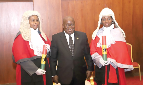 President Akufo-Addo (middle) with Dorothy Ayodele Kingsley Nyinah (left) and Ama Sefenya Ayittey, after they had been sworn in as High Court Judges at the Jubilee House. Picture: SAMUEL TEI ADANO