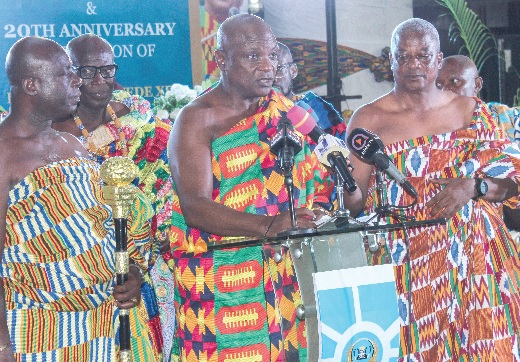 Togbe Afede XIV (middle), Agbogbomefia of Asogli and President of Asogli Traditional Council, speaking at the launch of his 20th Anniversary. with him are some of his elders. Picture: ERNEST KODZI