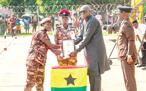 Jacqueline Mensah (left), receiving the Overall Best Award  from Ambrose Dery (2nd from right), Minister for the Interior. Picture: ESTHER ADJORKOR ADJEI