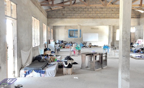 Belongings of flood victims in a classroom at St Kizito Senior High Technical School