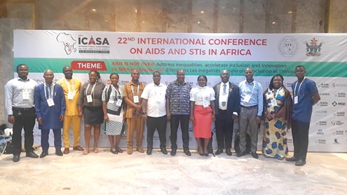 Dr Stephen Ayisi Addo (6th from right), Programme Manager, National AIDS/STIs Control Programme; Dr Raphael Adu-Gyamfi (3rd from left), Programme Officer, National AIDS/STIs Control Programme, with other members of Ghana's delegation